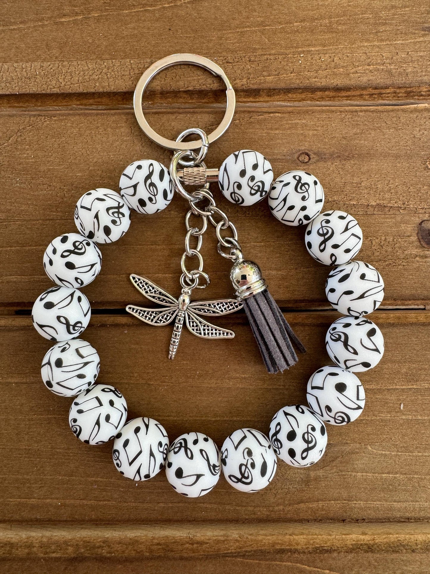 Elegant Stainless Steel Cable Wristlet - Silicone Beads, Leather Tassel & Dragonfly Charm