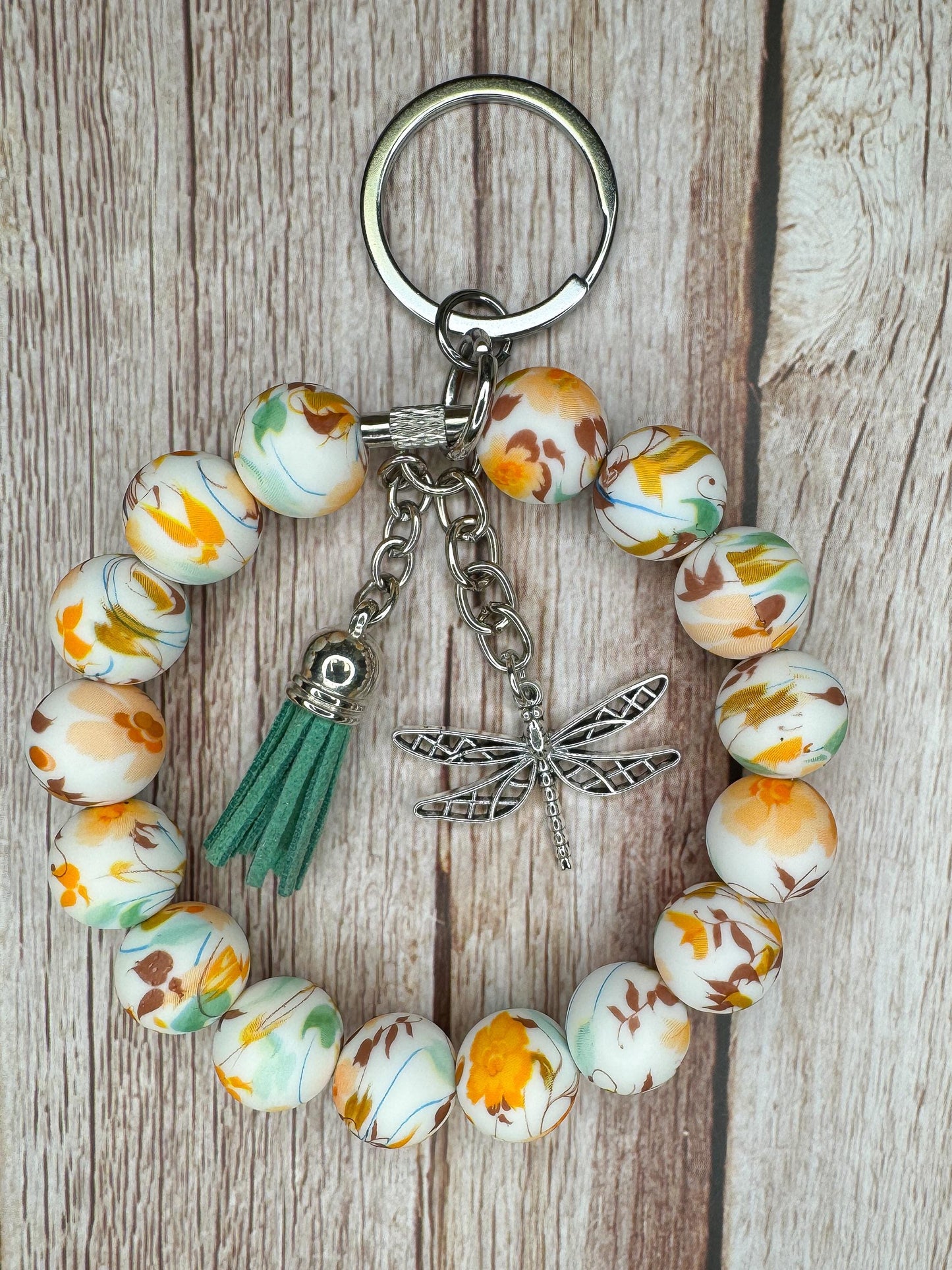 Stainless Steel Cable Wristlet - Silicone Beads, Leather Tassel & Dragonfly Charm